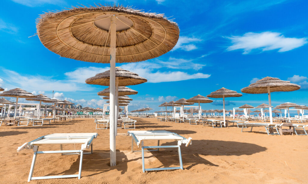 Large beach with sun beds on the Coast of Emilia-Romagna in Rimini