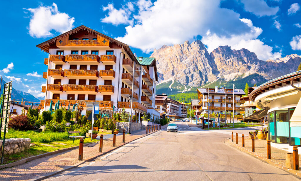 Cortina D' Ampezzo, street and Alps peaks view