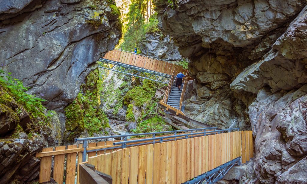 Wooden bridges and runways in Racines, Bolzano, lead through the canyon and give a spectacular sight to the waterfalls