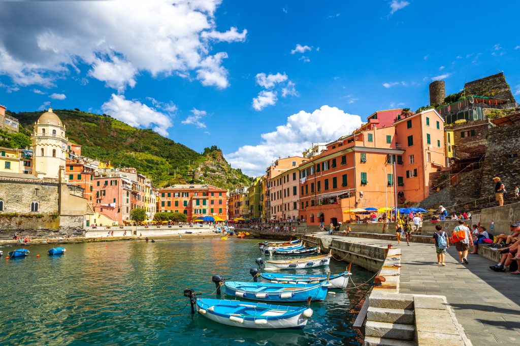 Boats and colorful houses in Vernezza, Italy.
