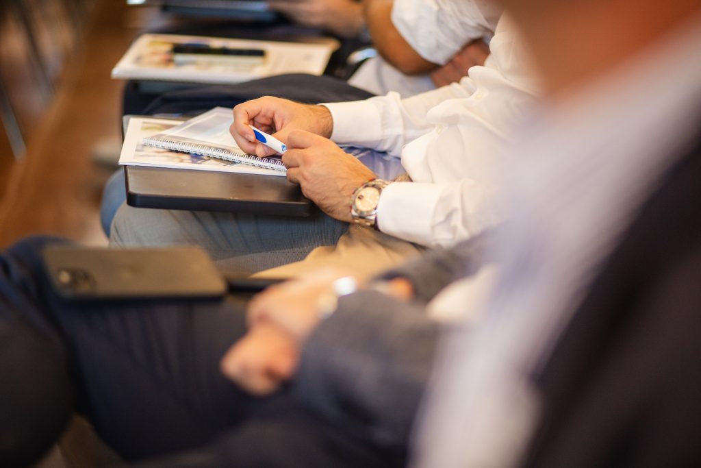 People sitting in a meeting.