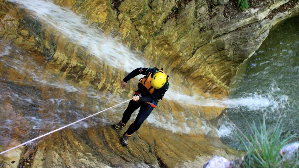 One person canyoning on Lake Garda, team building activity.